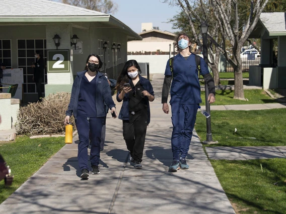 College of Medicine – Phoenix classmates Alexis Montoya, Bernice Alcanzo and Colton Cowan leave El Mirage Senior Housing complex, where they helped implement a pilot COVID-19 vaccine distribution program.