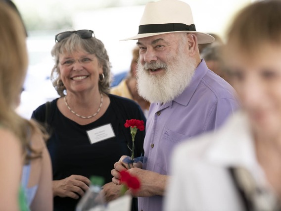 Andrew Weil, MD, visits with attendees before the groundbreaking for the Andrew Weil Center for Integrative Medicine on the University of Arizona Health Sciences campus in Tucson.
