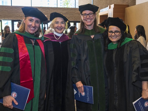 UArizona College of Medicine – Phoenix faculty pose for a photo after class of 2022 commencement ceremony. (From left) Natasha Keric, MD, director of surgery clerkship; Mandi Conway, MD, interim department chair, Ophthalmology; Susan Kaib, MD, FAAFP, career advisor, student affairs; and Marícela Moffitt, MD, MPH, FACP, director, doctoring curriculum.