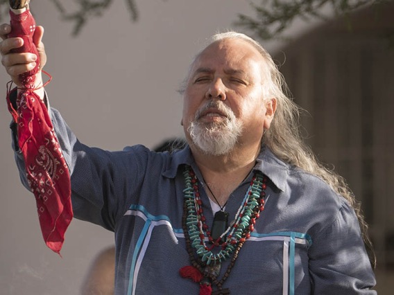 Carlos Gonzales, MD, performs a blessing ceremony using a prayer to the Seven Sacred Directions. This blessing involves recognizing the four cardinal points, plus above us (father sky), below us (mother Earth) and the center (the creator). 