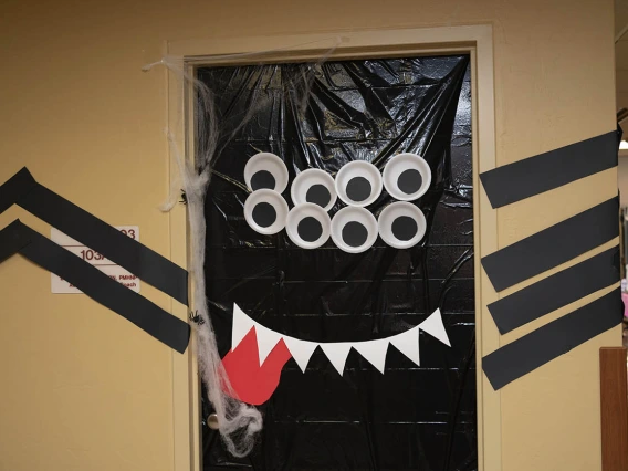 University of Arizona College of Nursing faculty and staff members ramped up their Halloween spirit with a door-decorating contest that included this giant spider, among other creative decorations.