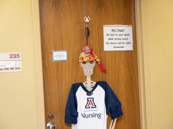 “Be kind to your spine” is the message this College of Nursing skeleton is promoting during the college’s Halloween door-decorating contest. 