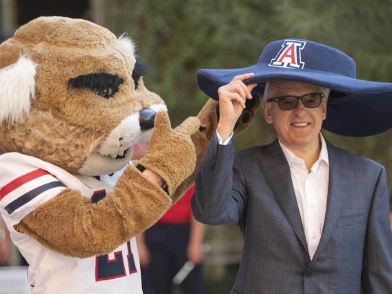 With a big gift comes the honor of wearing Wilber’s big hat, as Coit discovered during the celebration of his $50 million gift and naming of the R. Ken Coit College of Pharmacy. 