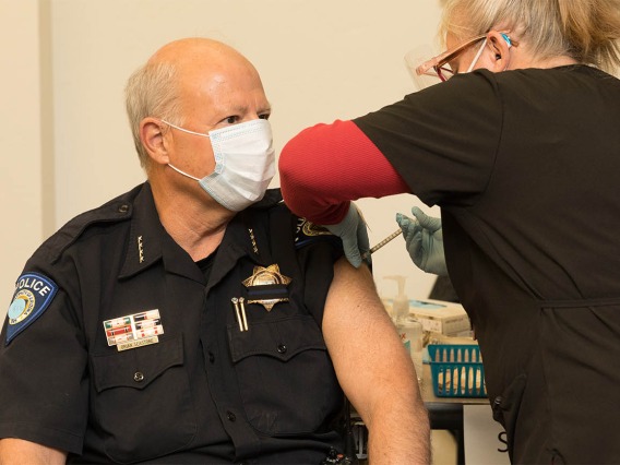 University of Arizona Police Chief Brian Seastone gets vaccinated at Campus Health.
