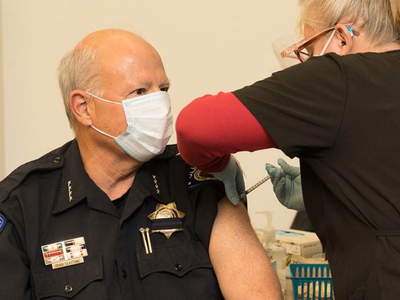 University of Arizona Police Chief Brian Seastone gets vaccinated at Campus Health.