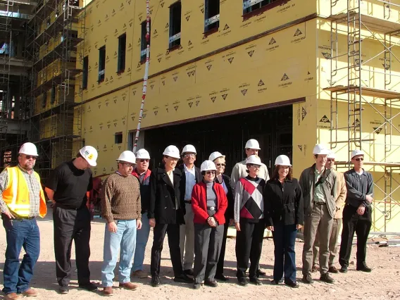 Faculty and staff take their first tour of Roy P. Drachman Hall in 2005, the future home of the Mel and Enid Zuckerman College of Public Health.