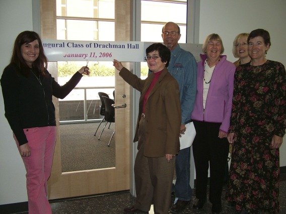 First day of class in Roy P. Drachman Hall, 2006. Jordana Choucair, left, poses with Dean G. Marie Swanson, PhD, MPH; Joel Meister; Jill deZapien; Chris Tisch; Denise Roe, DrPH.