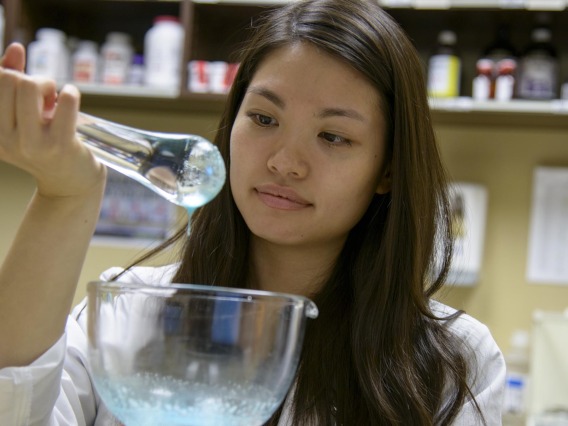Pharmacy student mixes compounded medication at the University of Arizona Cancer Center.