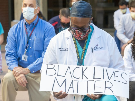 University of Arizona Health Sciences physicians and trainees gathered for a Black Lives Matter silent protest in June 2020 after the death of George Floyd, who had been murdered by a Minneapolis police officer. (Courtesy University of Arizona Department of Surgery)