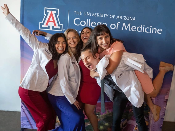 Jessmin Fernandez, Lauren Troeger, Tara Ghalambor, Austin Sherwood and Maëliss Gelas enjoy a moment of levity at the ceremony.