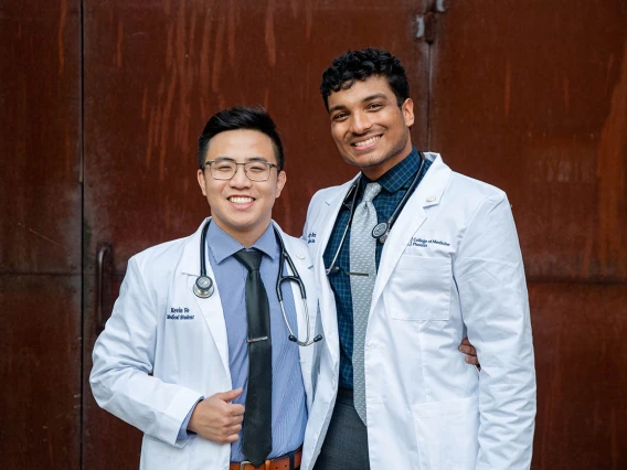 Kevin Vo and Ajay Bezawada celebrate after the ceremony.
