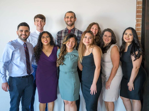 From front left, Obada Abdulrazzak, Sneha Singh, Bernice Alcanzo, Thresa Bui, Avery Williams and Jovanna Figueroa pause for a photo as they prepare for the white coat ceremony with Trevor Smith, Marcus Childs and Lindsey Malecha in the back row.  