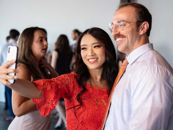 Maxine Yang and Sean McCauley mark the end of the white coat ceremony with a selfie. 