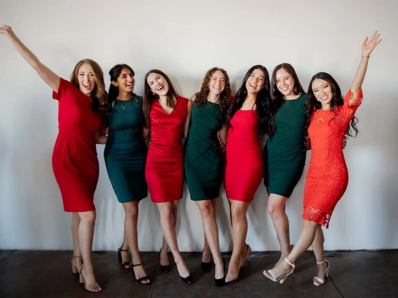 From left, Isabel Strouse, Meghna Jayaraman, Hannah Tolson, Sarah Nelson, Daniela Parga, Danielle Wenger and Maxine Yang celebrate before their long-awaited white coat ceremony.
