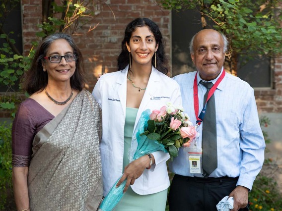 Jahnavi Shriram, center, with her family after the white coat ceremony.