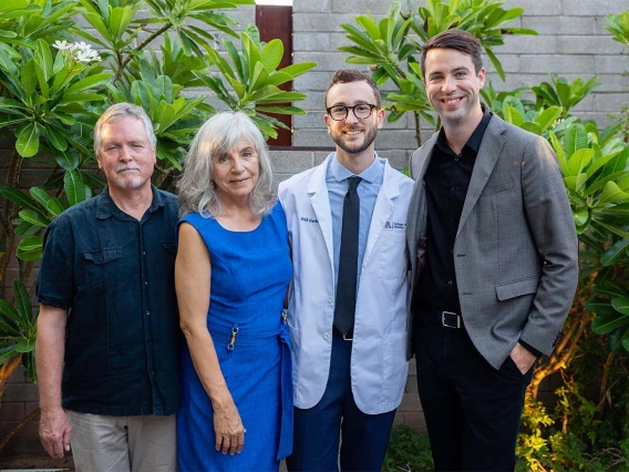 Erik Garber, second from right, with his family after the white coat ceremony.