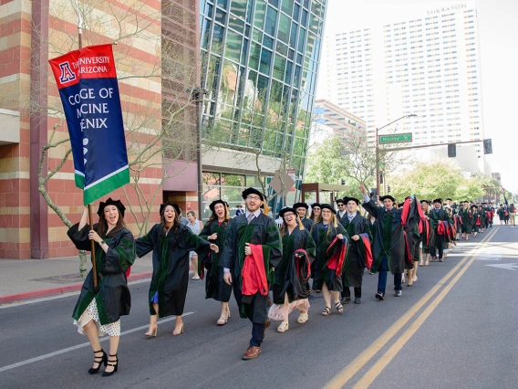 The College of Medicine – Phoenix class of 2022 parades through the streets of downtown Phoenix on their way to the Phoenix Convention Center for their commencement ceremony.