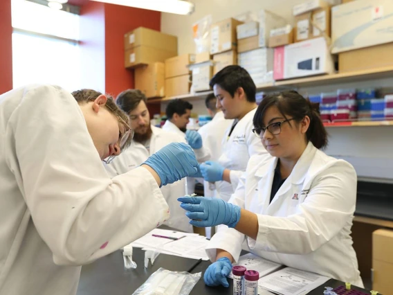 group of diverse students in a classroom