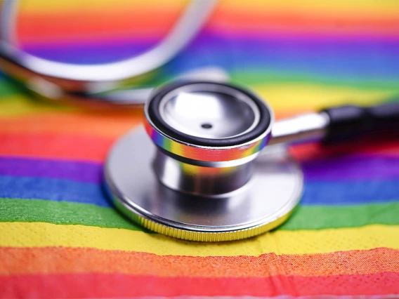 Stethoscope on pride flag.