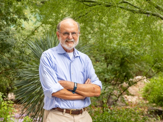 portrait of John Galgiani, MD, in a lush Sonoran desert location