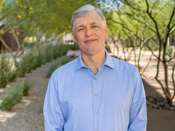 outdoor portrait of College of Medicine _ Phoenix child health professor Dr. Vlad Kalinichenko