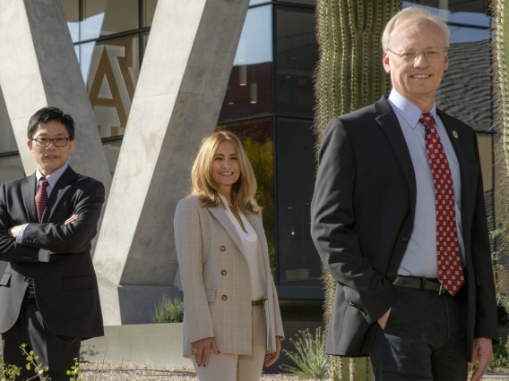 Arizona Center for Drug Discovery Co-Directors, from left, Wei Wang, PhD, and Celina Zerbinatti, PhD, along with College of Pharmacy Dean Rick G. Schnellmann, PhD.