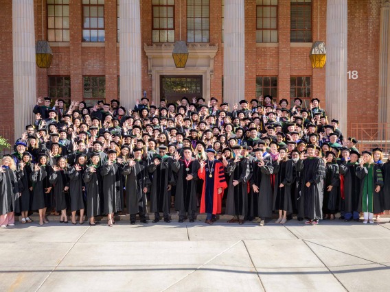 College of Medicine – Tucson Class of 2024 medical students on steps in front of Centennial Hall