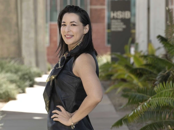 Portrait of Celina Valencia, DrPH, standing outside