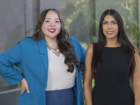 Portrait of Alyssa Padilla standing next to Stephanie Feder