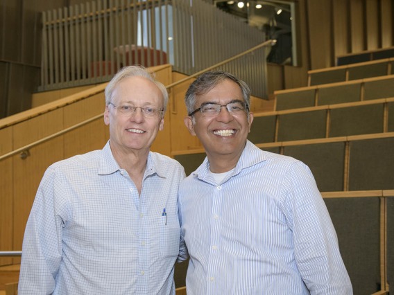 Rick Schnellmann, PhD, (left) dean of the R. Ken Coit College of Pharmacy, and Nirav Merchant, director of the Data Science Institute and director of Cyber Innovation in the Office of Research, Innovation and Impact, and a member of the BIO5 Institute, pause for a photo during the All of Us UArizona-Banner 50k Strong Arizona Celebration and Research Showcase in the Health Sciences Innovation Building.