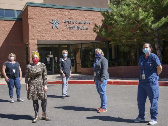 Medical workers prepare to begin antibody testing at a clinic in Flagstaff. Front row: UArizona almuna Charlene Clements, Winslow Indian Health care center, alumna April Alvarez-Corona, chief medical officer of North Country Health Care. Middle row: Anne Newland, chief executive officer of North Country Health Care. Back row: Kelly Kendall, Marti Neff, chief operations officer for North Country Health Care.