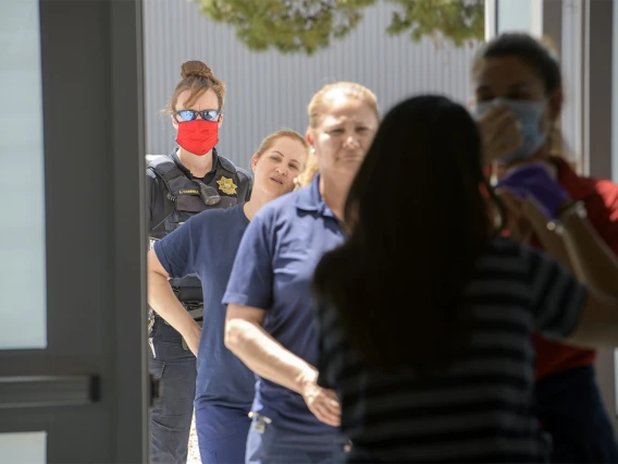 Frontline workers and first responders are among the first to receive a COVID-19 antibody test in the temporary clinic set up inside the Cole and Jeannie Davis Sports Center.