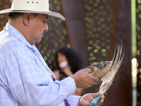 Miguel Flores Jr., a Native American traditional healer from the Pascua Yaqui and Tohono O’odham tribes, prepares to lead the blessing ceremony at the Phoenix Bioscience Core.