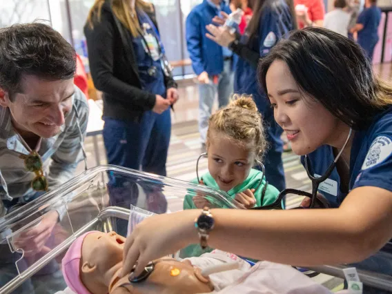 Volunteers from the University of Arizona College of Nursing demonstrate skills.