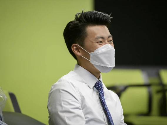 First-year medical student Michael Kim receives his white coat and meets his house dean, who tells students what they can expect from their four-year journey through medical school.