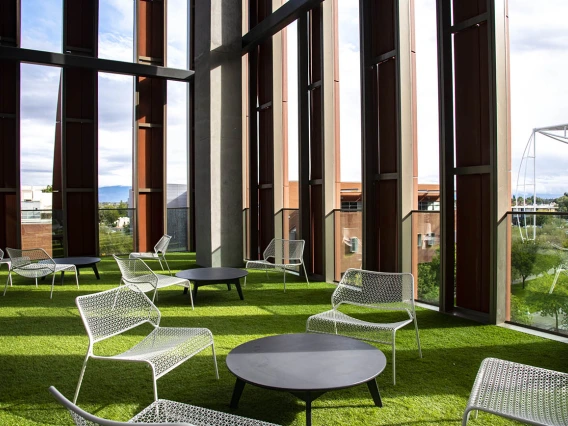 This fourth floor, open-air porch is in the southeast corner of the Health Sciences Innovation Building. Yes, that is artificial grass underfoot, so don’t be surprised if you see someone sprawled out taking a quick nap between classes or meetings. 