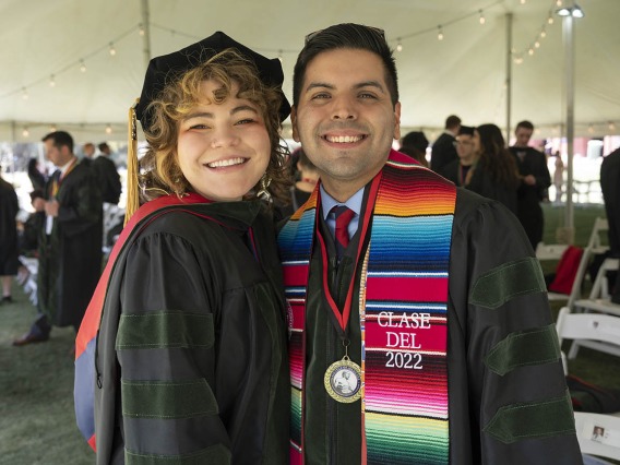 Marisa Delgado, MD, and Eduardo Quiñonez, MD, excitedly wait for their College of Medicine – Tucson class of 2022 convocation at Centennial Hall to begin.