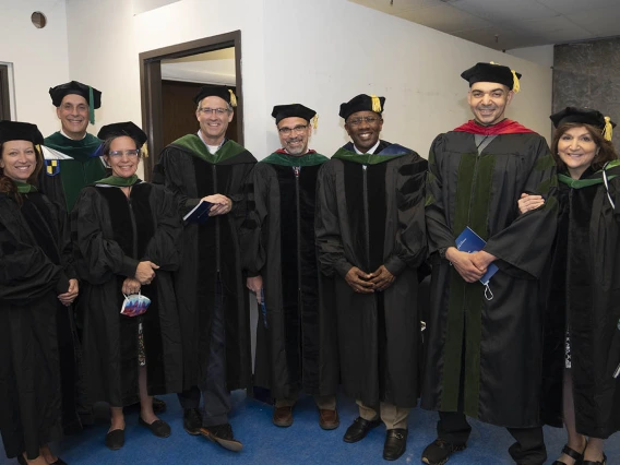 UArizona College of Medicine – Tucson faculty stand ready to go on stage for the class of 2022 convocation in Centennial Hall. 