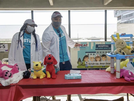 Mark Strickling, discovery officer specialist at the University of Arizona Foundation, and his daughter Semia worked together to set up the Wildcat Play Hospital, run by the Black African American Caribbean Employee Resource Group. 