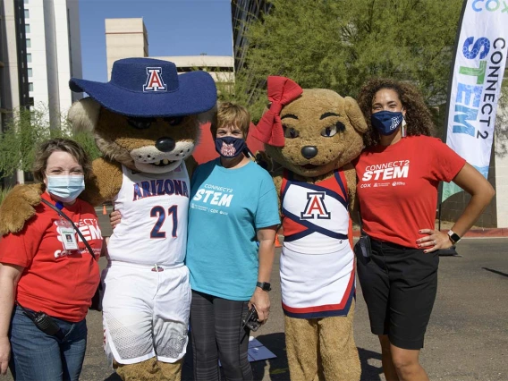 Wilbur and Wilma take a moment to thank UArizona Health Sciences Corporate and Community Relations team members, from left, Caroline Berger, Annemarie Medina and Allison Otu, for organizing the Connect2STEM event. 