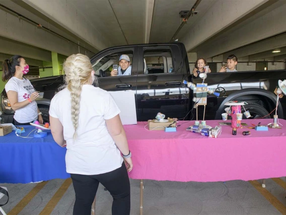 The Girls Innovation Academy caught the attention of these STEM enthusiasts as they took pictures of the innovations on display. The school aims to inspire a pathway to science, technology and engineering.