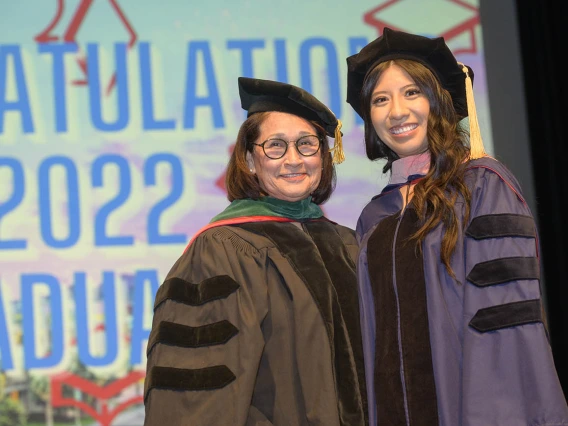 (From left) Cecilia Rosales, MD, associate dean of Phoenix programs, pauses for a photo with Doctor of Public Health graduate Sheila Soto at the Mel and Enid Zuckerman College of Public Health fall convocation.