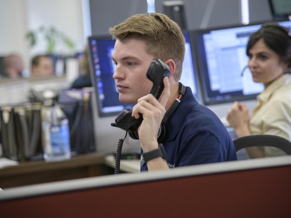 Briggs Carhart, a master’s degree student in public health, helps the Arizona Poison and Drug Information Center field the hundreds of daily calls they received in mid-March from people worried about the COVID-19 pandemic.