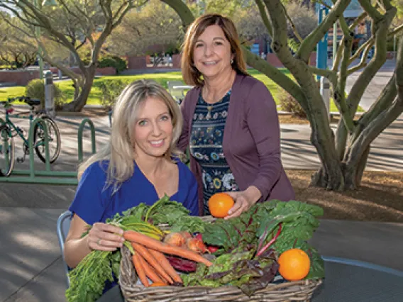 Tracy Crane, PhD (left), and Cynthia Thomson, PhD, RD