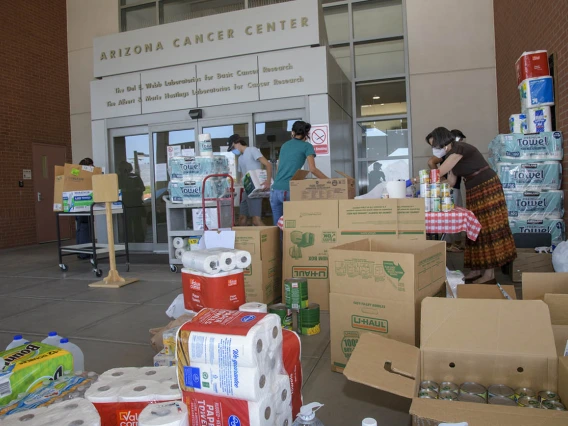 The University of Arizona Cancer Center held a donation drive in late May to assist the Navajo Nation, which has been hard hit by the COVID-19 pandemic. Members of the Partnership for Native American Cancer Prevention (NACP) collected the donations: Margaret Briehl, PhD, principal investigator and professor of pathology; Maria Lluria-Prevatt, PhD, research administrator; Tiffani Begay, MPH, research education core senior program coordinator; Debbie Aguirre, administrative associate.