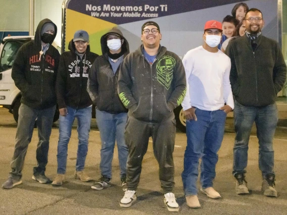 From left: Oscar Moreno, Mara Rodriguez, Jairo Lopez, Ruben Sosa, Nestor Quiñonez and Jesús Pérez – all farmworkers from Agua Prieta, Mexico – gathered at the Consulate of Mexico in Douglas, Arizona, for a COVID-19 vaccine clinic hosted by UArizona Health Sciences and the Cochise County Health Department.