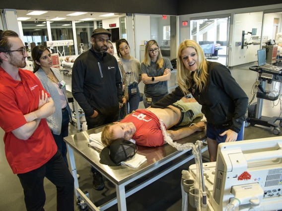 ASTEC’s SimDeck is a two-story soundstage and training environment. Here, emergency medicine students learn ultrasound techniques in a simulated environment.