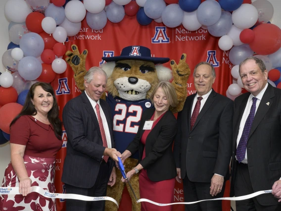 (From left) Gilbert Mayor Brigette Peterson, University of Arizona President Robert C. Robbins, MD, Wilbur Wildcat, Kathleen Insel, PhD, interim dean of the UArizona College of Nursing, Rep. Andy Biggs and University of Arizona Health Sciences Senior Vice President Michael D. Dake, MD, cut the ceremonial ribbon for the new and renovated College of Nursing facilities in Gilbert, Arizona.