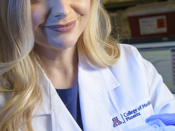 Melissa Herbst-Kralovetz, PhD, with samples that may unlock some clues about vaginal health and gynecologic cancer.