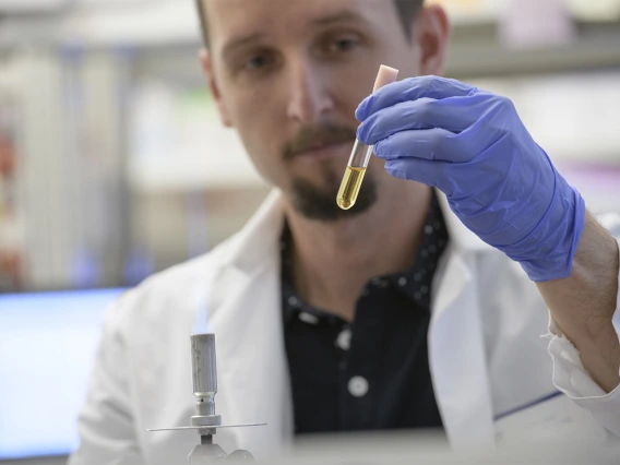 Paweł Łaniewski, PhD, at work as an assistant research scientist in the Herbst-Kralovetz Lab.